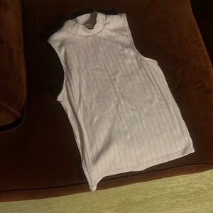 Purple sleeveless turtleneck